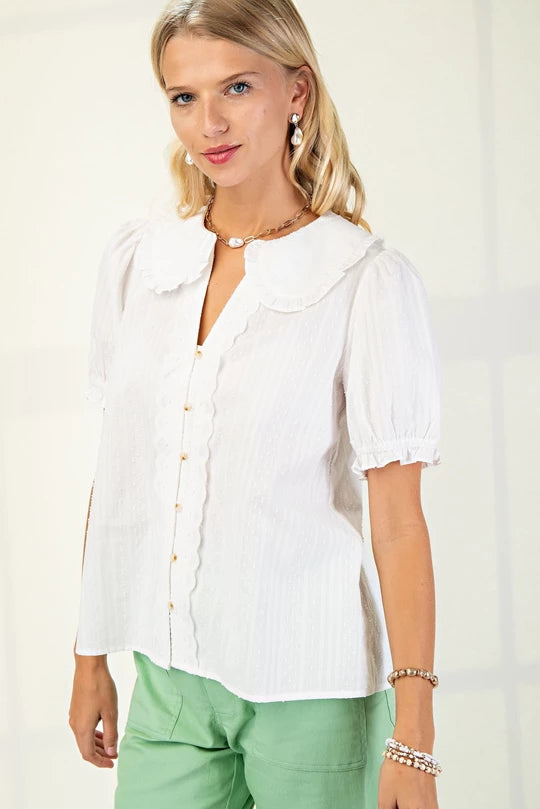 Dainty button up top