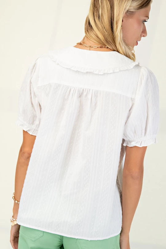 Dainty button up top