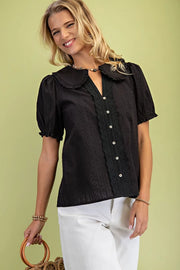 Dainty button up top